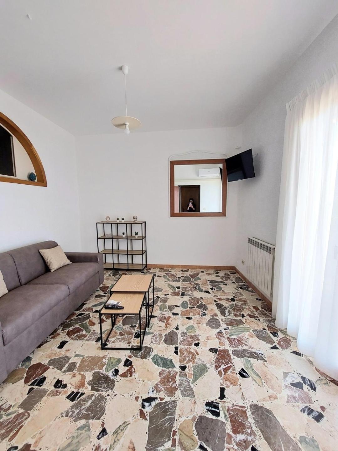 A Casa Dei Nonni Apartment จีอาร์ดีนี นักซอส ภายนอก รูปภาพ