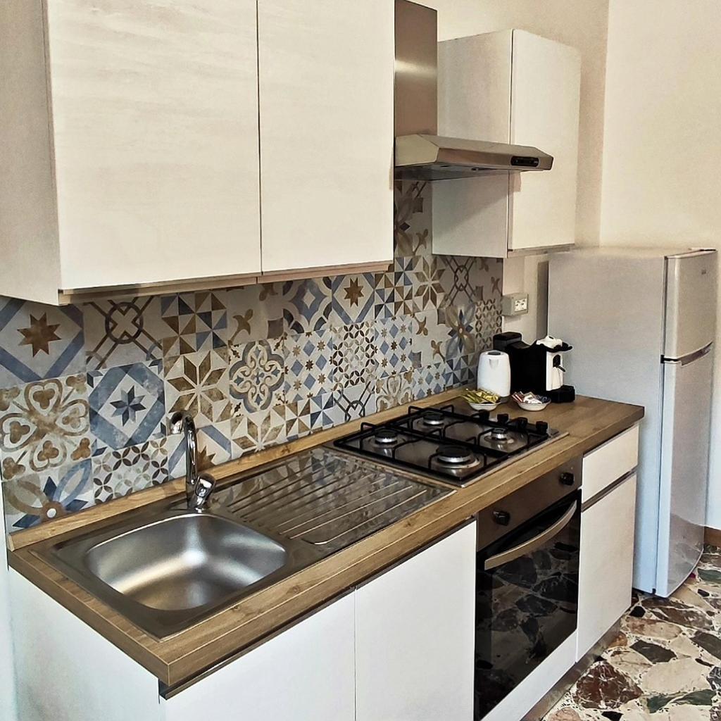 A Casa Dei Nonni Apartment จีอาร์ดีนี นักซอส ภายนอก รูปภาพ