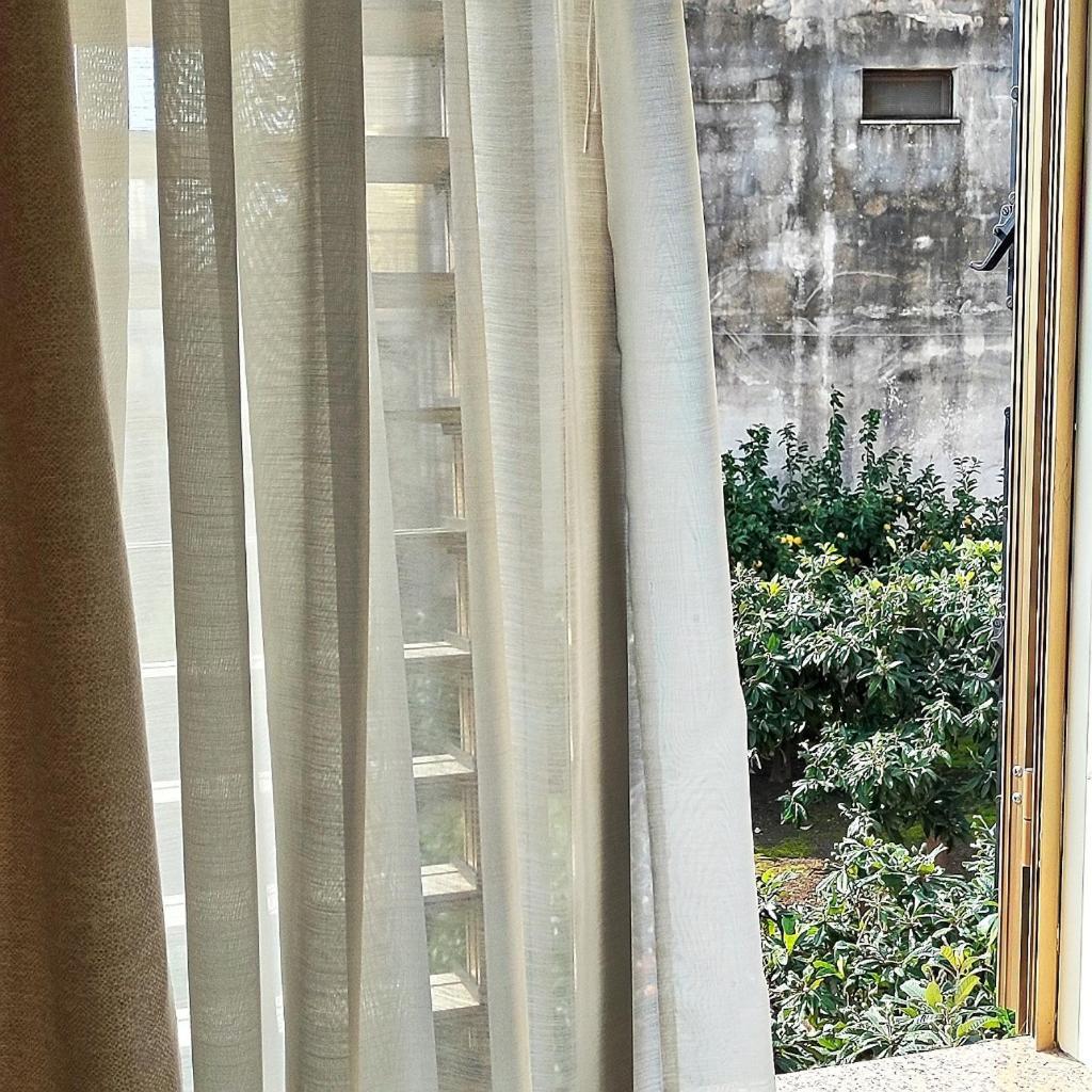A Casa Dei Nonni Apartment จีอาร์ดีนี นักซอส ภายนอก รูปภาพ